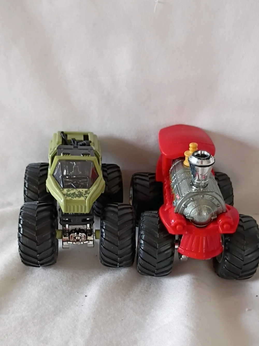 EUC Hot Wheels Monster Jam Soldier Fortune And Derailed Train Trucks Pair Of 2